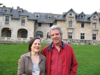 KatharitaParsons-Lamoza(65)&herHusbandoutsidethemainhouse